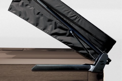 The CoverMate III cover lifter installed on a Bullfrog Spa from the X Series, demonstrating its ease of use and functionality.